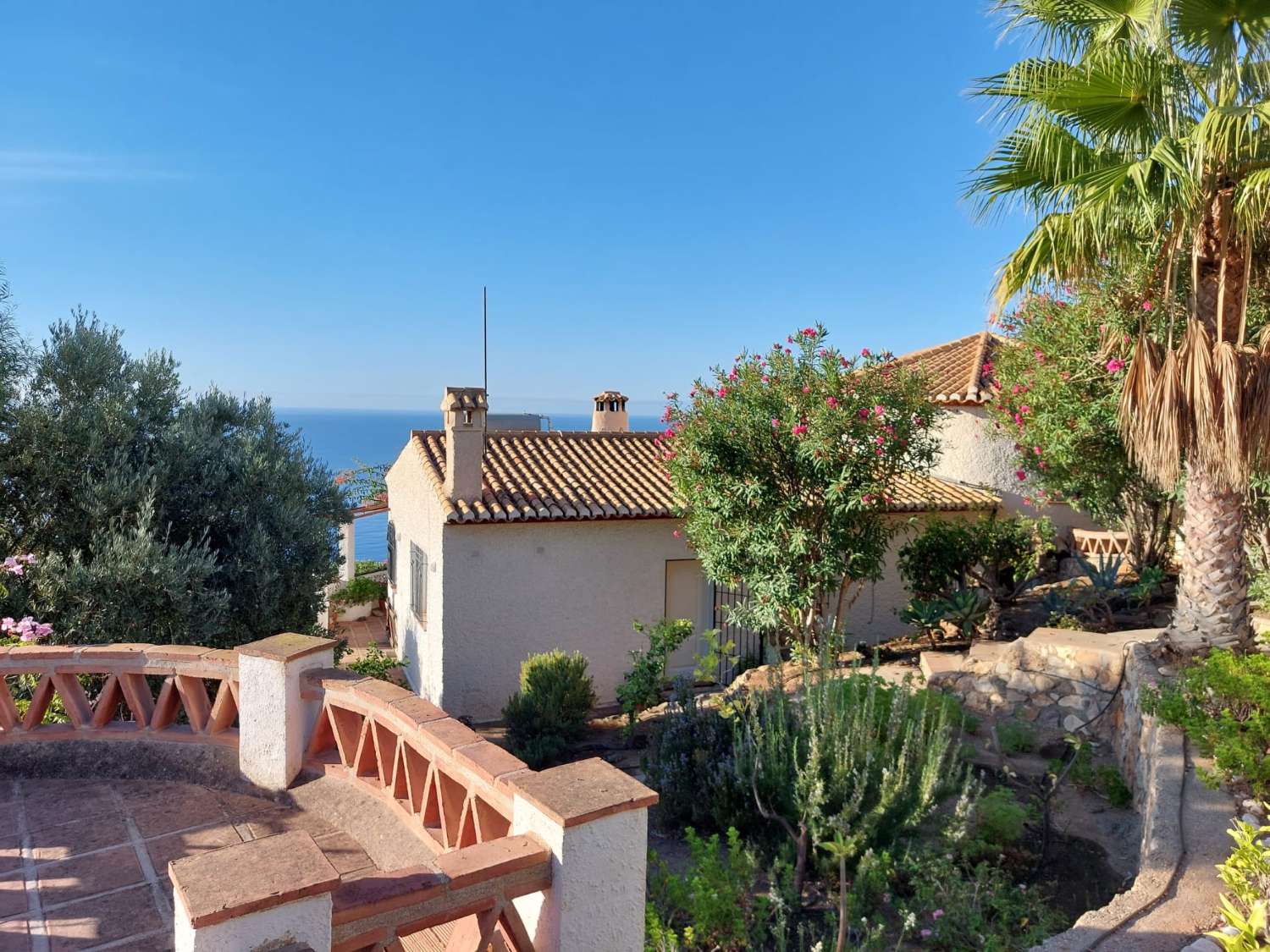 Wonderful villa for sale with private pool, mature gardens and panoramic sea views