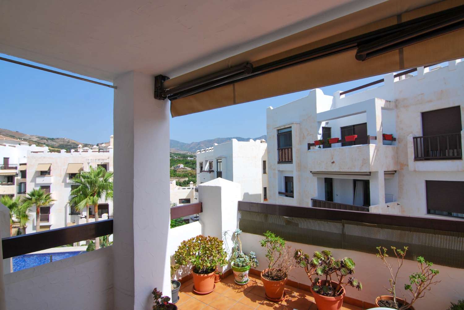 Lichte flat te koop in de urbanisatie Oasis